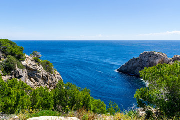 Fototapeta na wymiar Mallorca, Above the blue sea at the cliffline of capdepera