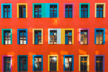 beautiful colorful facade at berlin with light leaks on the building