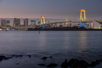 Fototapeta premium Rainbow bridge at sunset tokyo Japan