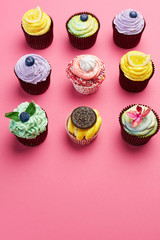 Colorful Cupcakes On Pink Background