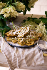 elderflower blossoms deep-fried..style vintage