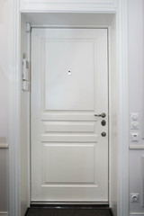 White entrance door  in modern home