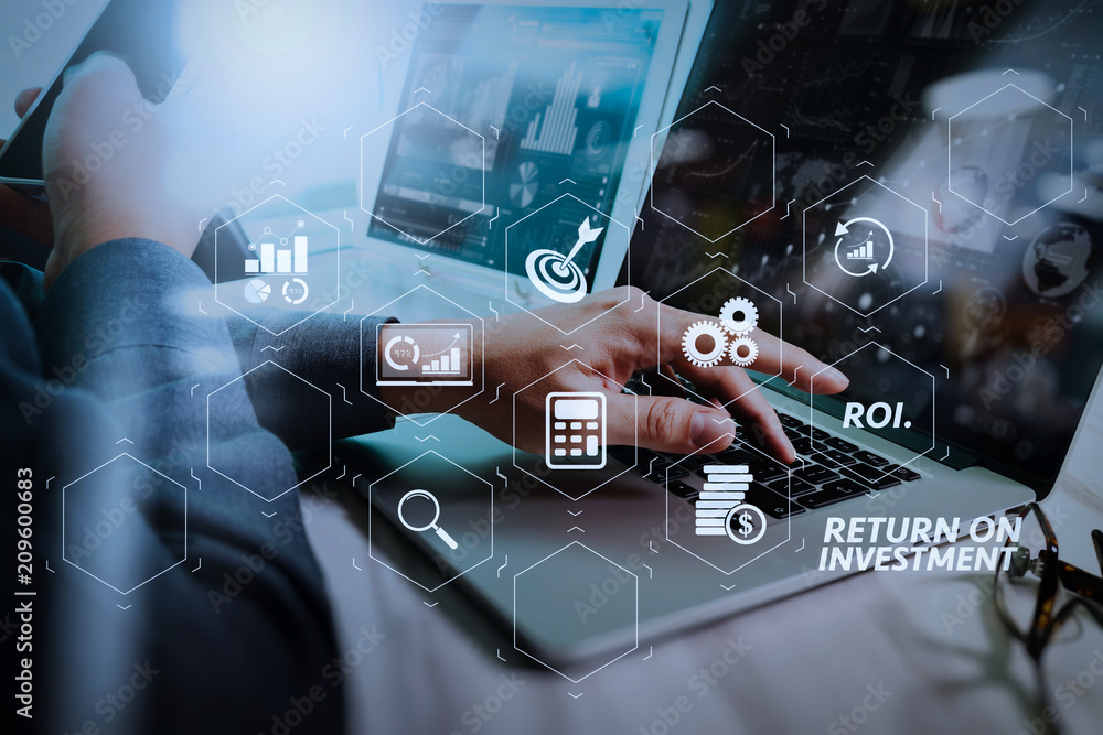Poster businessman hand working on laptop computer with digital layer business strategy and social media di