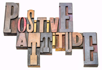 positive attitude word abstract in wood type