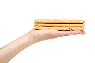Crispy cookies with chocolate fill with hand isolated on a white background