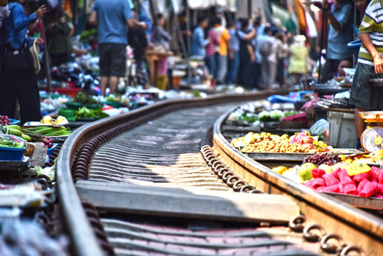 Selling Food On The Maeklong Railway Market In Thailand