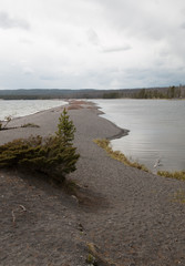 Small spit of sand called Hard Road to Follow on the banks of Yellowstone Lake in Yellowstone National Park in Wyoming United States