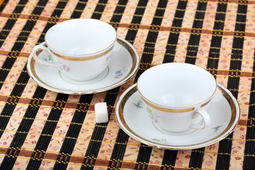 Two empty white porcelain cup on the table