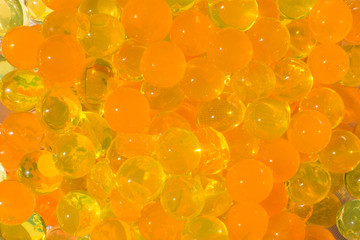 Shiny water gel balls. Abstract background.