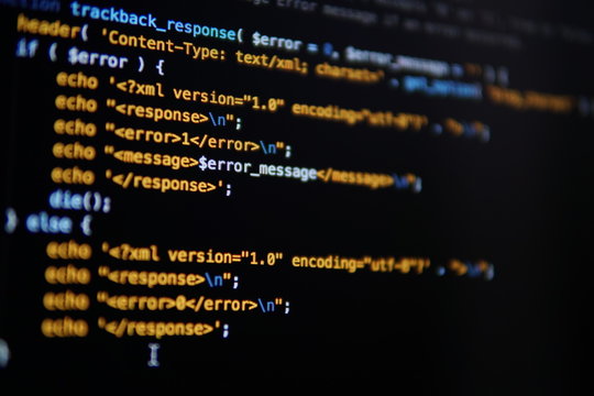Simple website HTML code with colorful tags in browser view on dark background. Software developer programming code. Screen of code for overlay background.