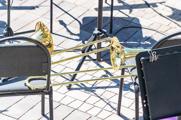 A trombone on a chair