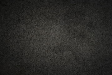 Dark concrete texture with center soft light