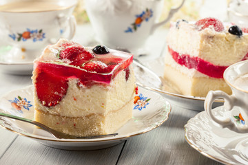 Cheesecake with strawberries, blueberry and jelly