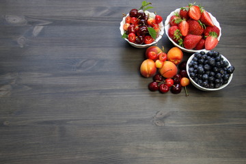 fruit on a dark wooden table