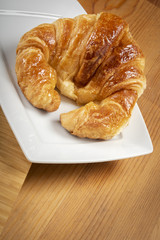 Delicious croissant on the plate