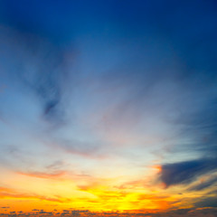 Naklejka na ściany i meble Cloudy sky and bright sun rise over the horizon.