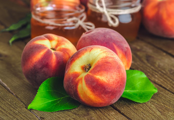 fresh peaches on wooden table