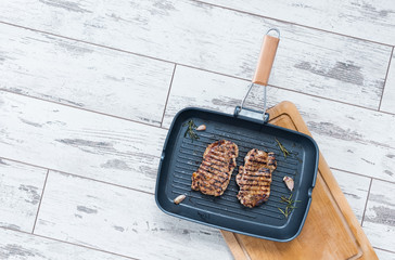 Two Grilled Steaks On a Grill Pan. Top View.