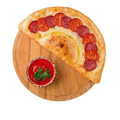 Pizza in pita bread with sauce over white background