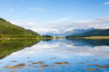 Loch Leven.  The view across Loch Leven from Ballachulish towards Ballachulish Bridge in the Scottish highlands.  Loch Leven is a sea loch on the west coast of Scotland.