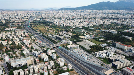 Fototapeta premium Aerial drone bird's eye view of popular highway of Attiki Odos multilevel junction ring road, passing through Kifisias Avenue in Marousi