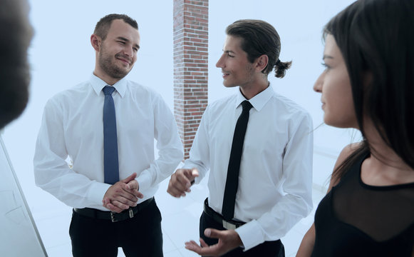 closeup of a business team discussing the current issues