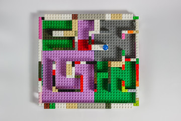 Fototapeta premium construction of multi-colored details of the designer on a gray background -