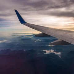 Fototapeta na wymiar Amaizing view from plane into mountais