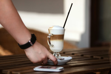Fototapeta na wymiar latte art coffee design cafe pouring hot milk espresso