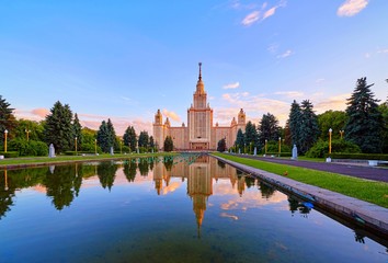 Wide angle vibrant panoramic view of sunset Moscow university campus under dramatic sky in spring...