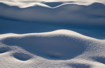 texture of   snow under the sunlight close up