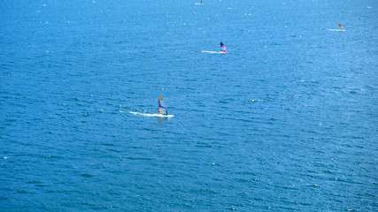 Fototapeta na wymiar Wind surf sul Lago di Garda in Trentino