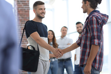 Obraz premium handshake staff of the Agency