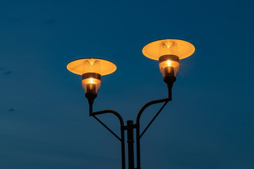 Fototapeta na wymiar lamp \ street lamp against the background of the evening sky