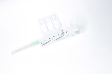 Medical syringe on white