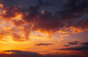 Fototapeta premium Colorful sunset with clouds. Beautiful evening background. Compositions of nature