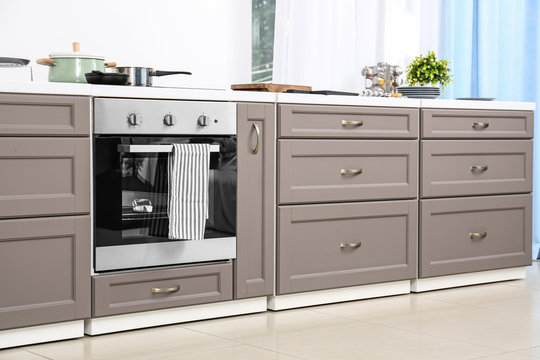 Modern kitchen furniture with electric stove