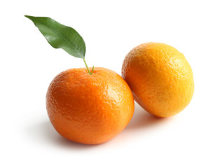 Ripe tangerines on white background