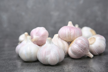 Ripe garlic bulbs on table. Organic product