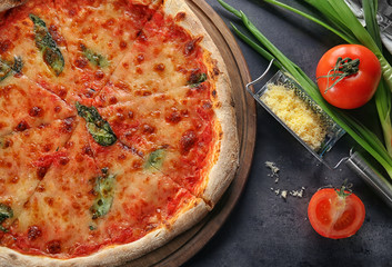 Tasty pizza on table. Fresh from oven