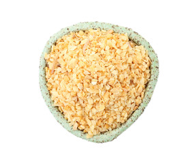 Bowl of granulated dry garlic on white background, top view