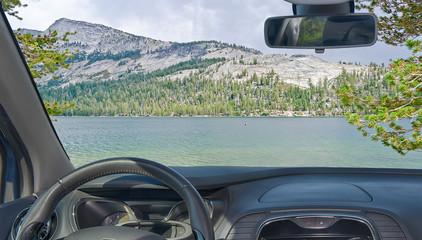 Windshield view of lake in Yosemite National Park, California, USA