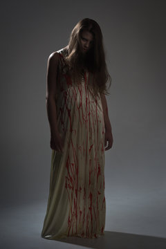 Girl in a bloody dress