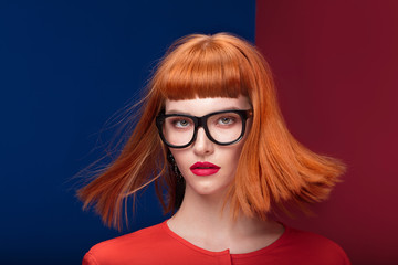 Colorful portrait of redhead woman.