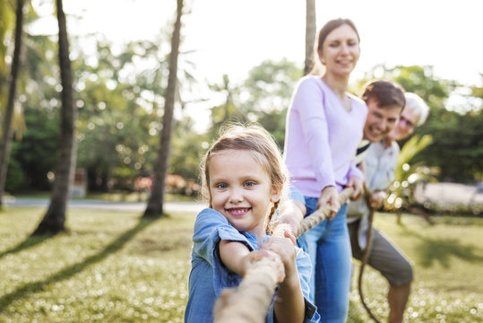 Family Playing Tug Of War