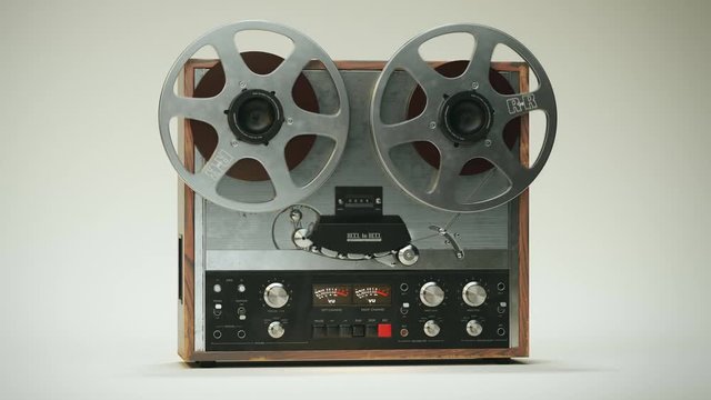 Retro analog reel-to-reel magnetic tape recorder.  Vintage audio recorder.