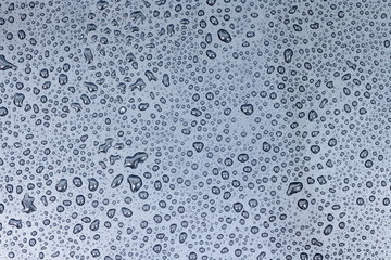Black background filled with water droplets