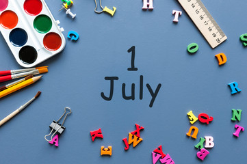 July 1st. Image of july 1, calendar on blue background with school supplies. Summer time