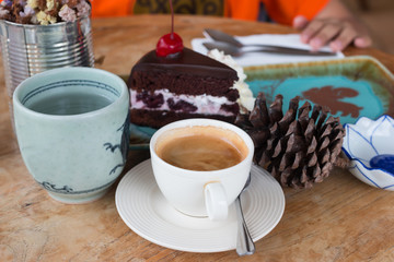 Hot coffee with chocolate cakes
