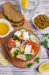 Salad of raw vegetables in oil